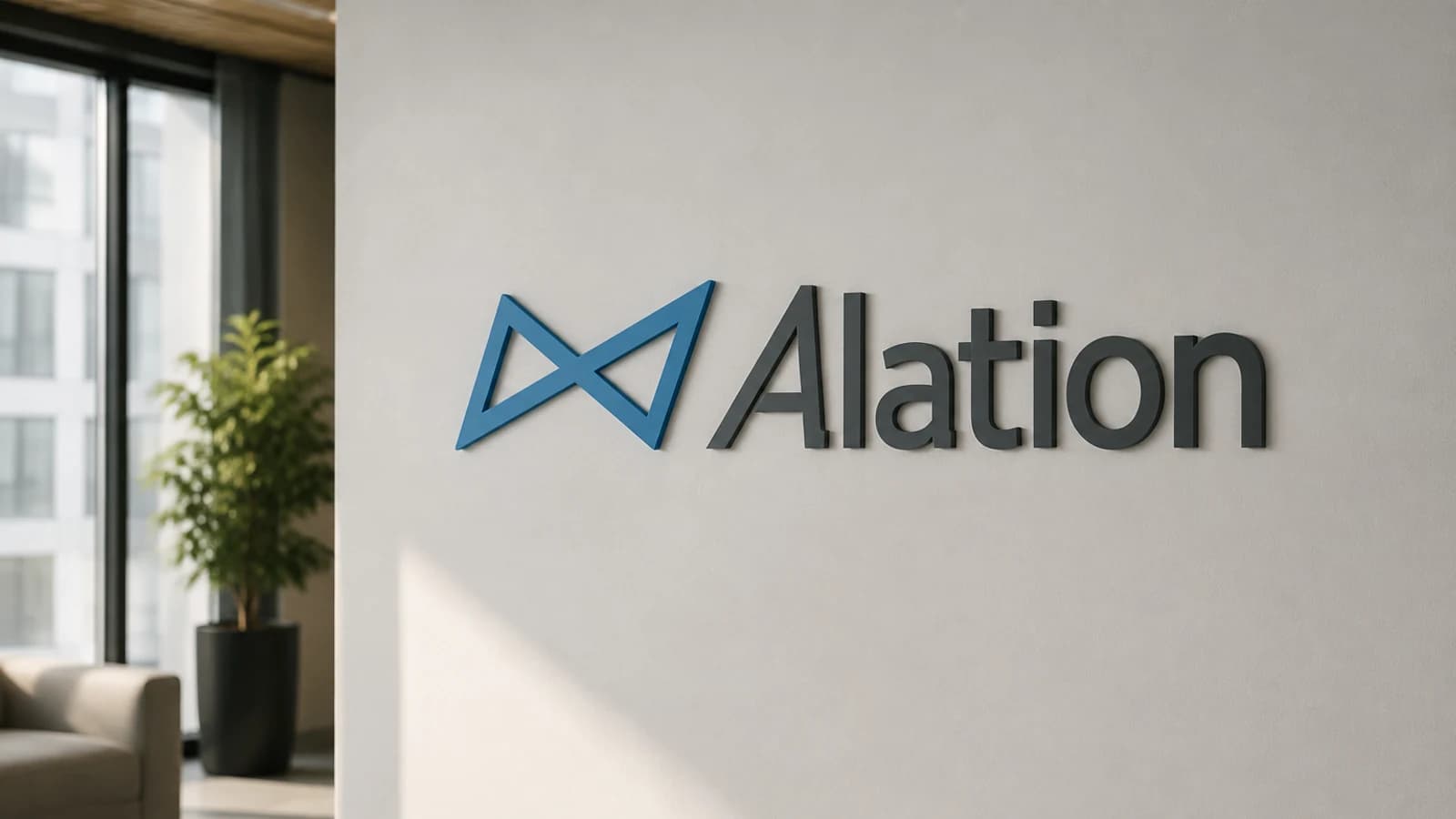 Логотип Alation на корпоративном мероприятии или в офисе компании